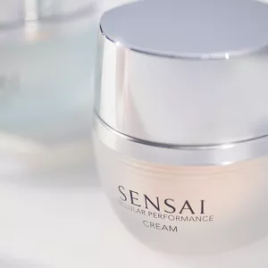 A close up of the Cellular Performance Cream jar on a white surface